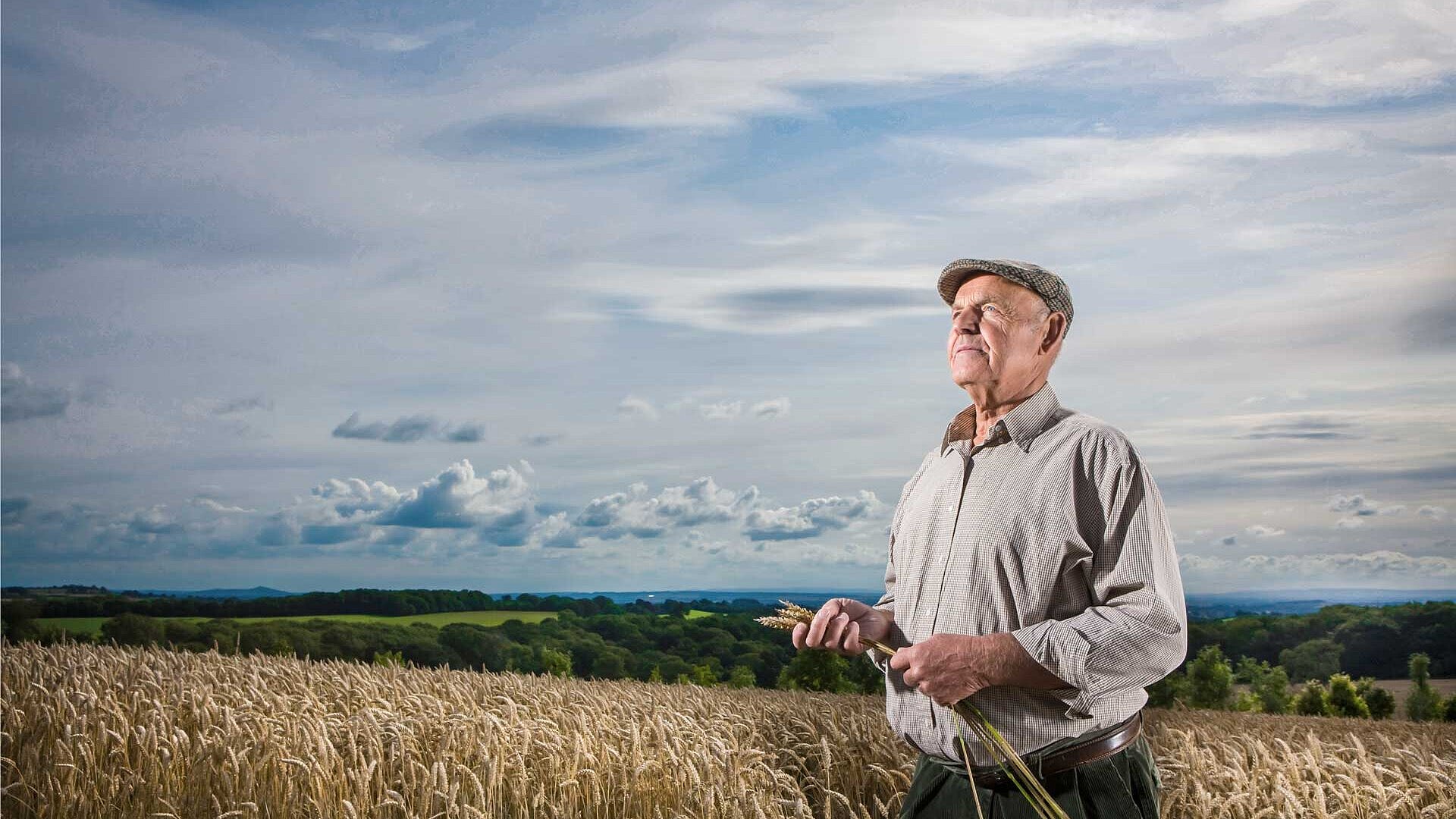 Farmer with grain in his hand