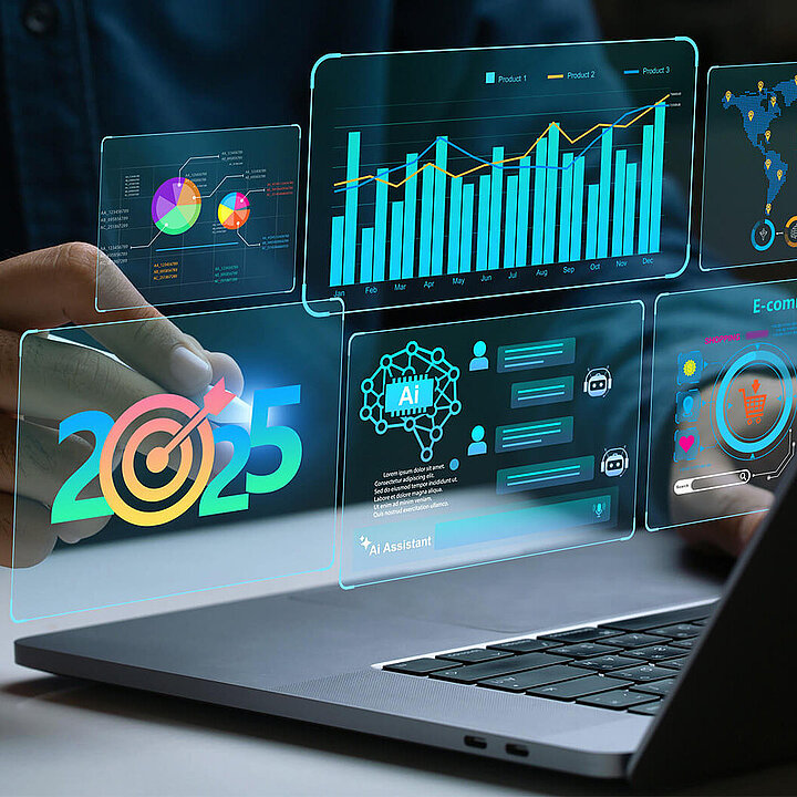 Picture showing a laptop and some modern 2025 data